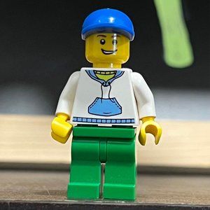 Lego City Minifigure with Green Pants, Blue Hat, and White Jacket